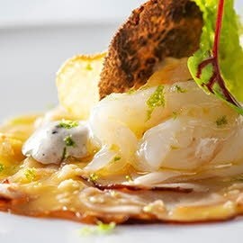 Fraîcheur de langoustines, carpaccio de cèpes, vinaigrette aux truffes