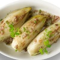 Gebakken witloof met tijm, honing en peterselie