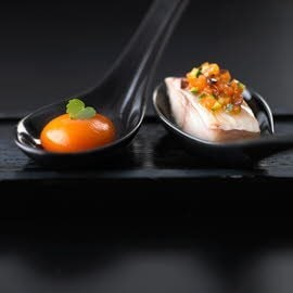 Ravioli van paprika met rode poon en gemarineerde groenten