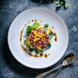 Wilde paddenstoelenrisotto met gerookte eendenborst