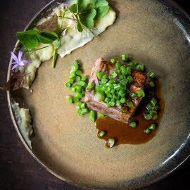 Lamsschenkel met prinsessenboontjes en aardappelsmeus