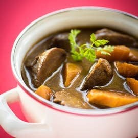 Varkenswangen, zoete aardappel en pompoen