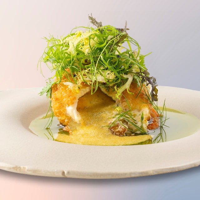 Gefrituurde pladijs met butternutpuree en een kruidenslaatje uit Kiev