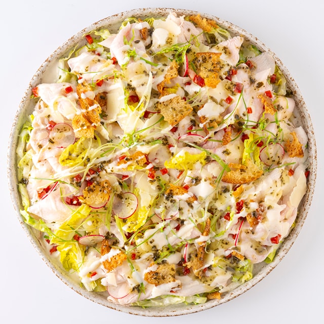 Carpaccio van kip met chorizo, manchego en caesardressing