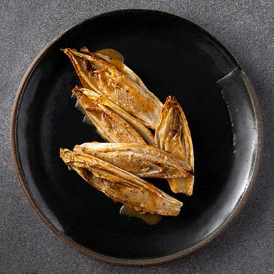 Gekarameliseerd witloof met tijm en honing